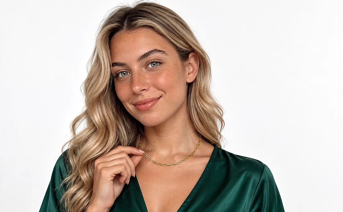 Auricelia jewelry worn in a distinct green outfit