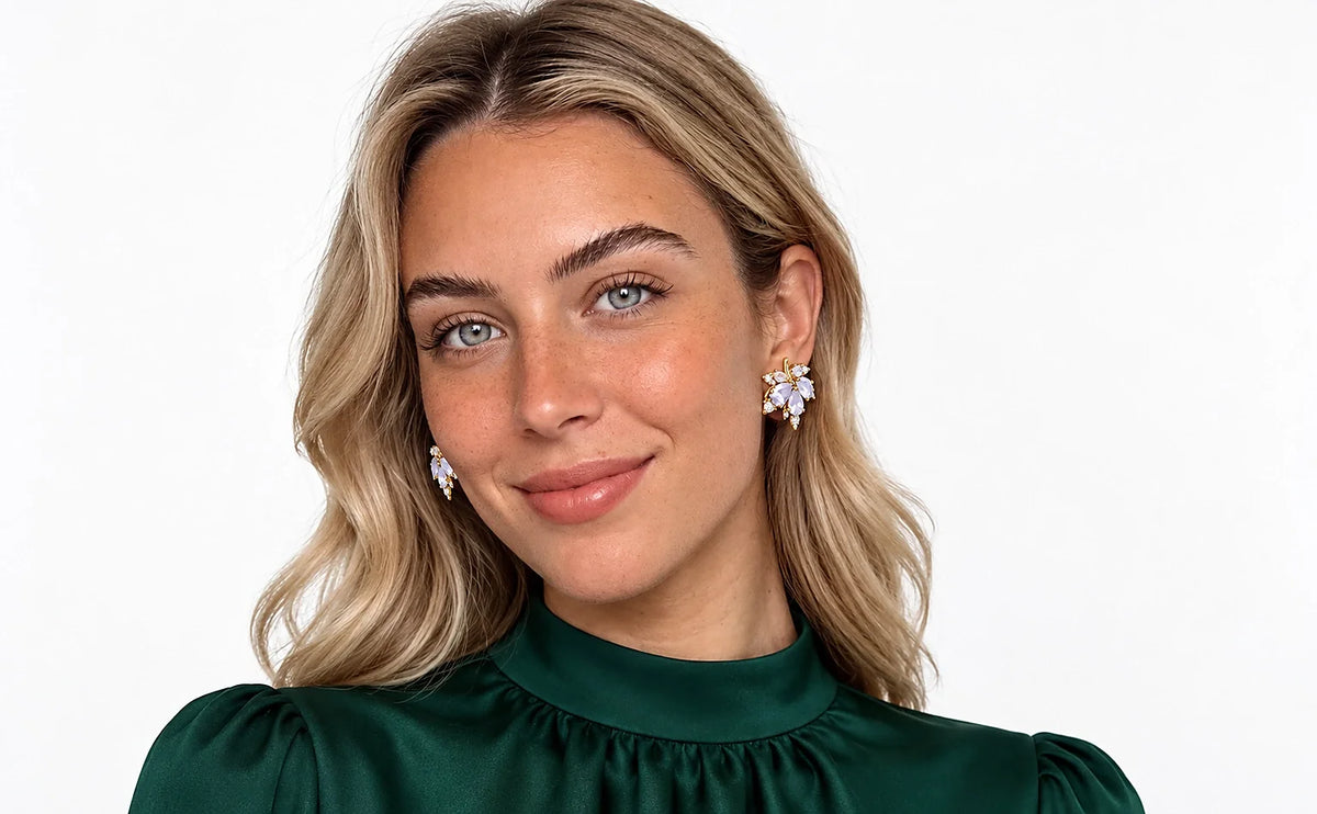 Auricelia jewelry worn in a distinct green outfit