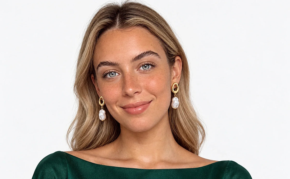 Auricelia jewelry worn in a distinct green outfit