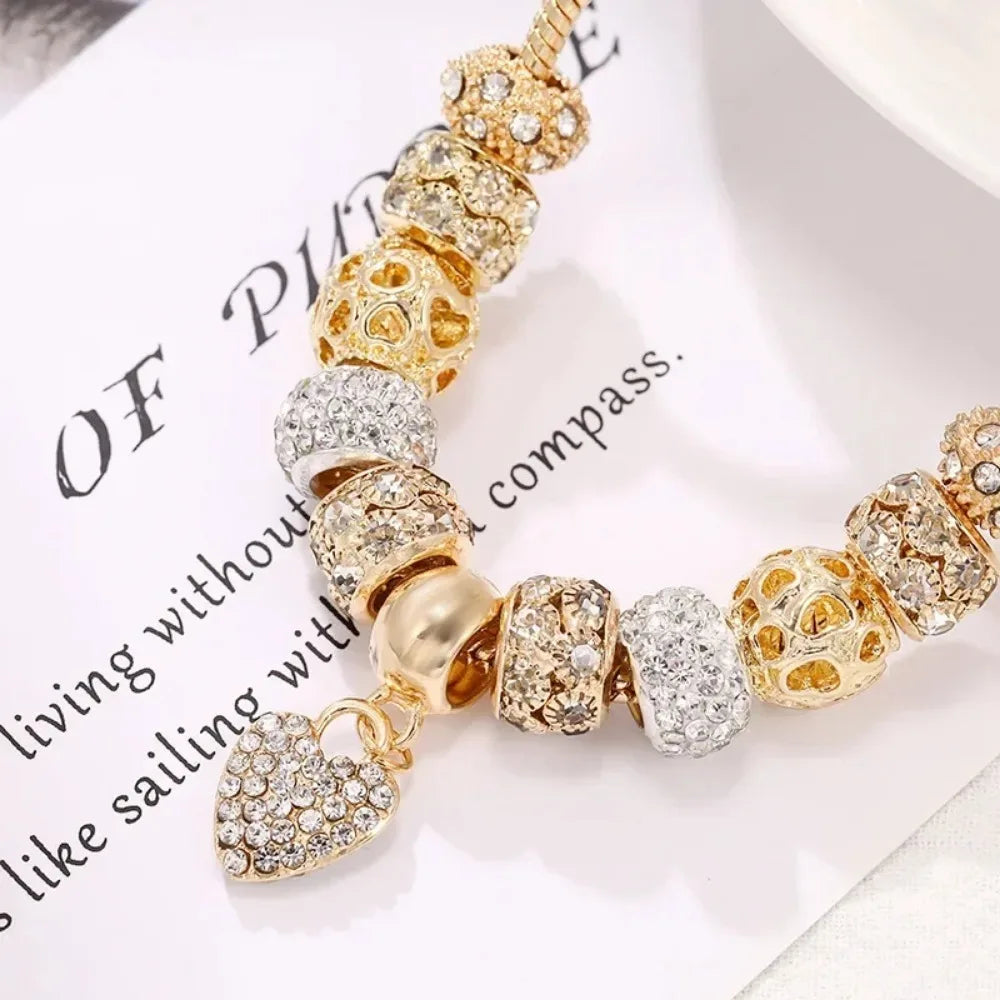 https://ae01.alicdn.com/kf/S1cf0dc1599e74b51889d570e97758999S/New-Charm-Crystal-Heart-Beads-Charm-Bracelets-Gold-Color-Stainless-Steel-Snake-Chain-Brand-Bangle-for.jpg