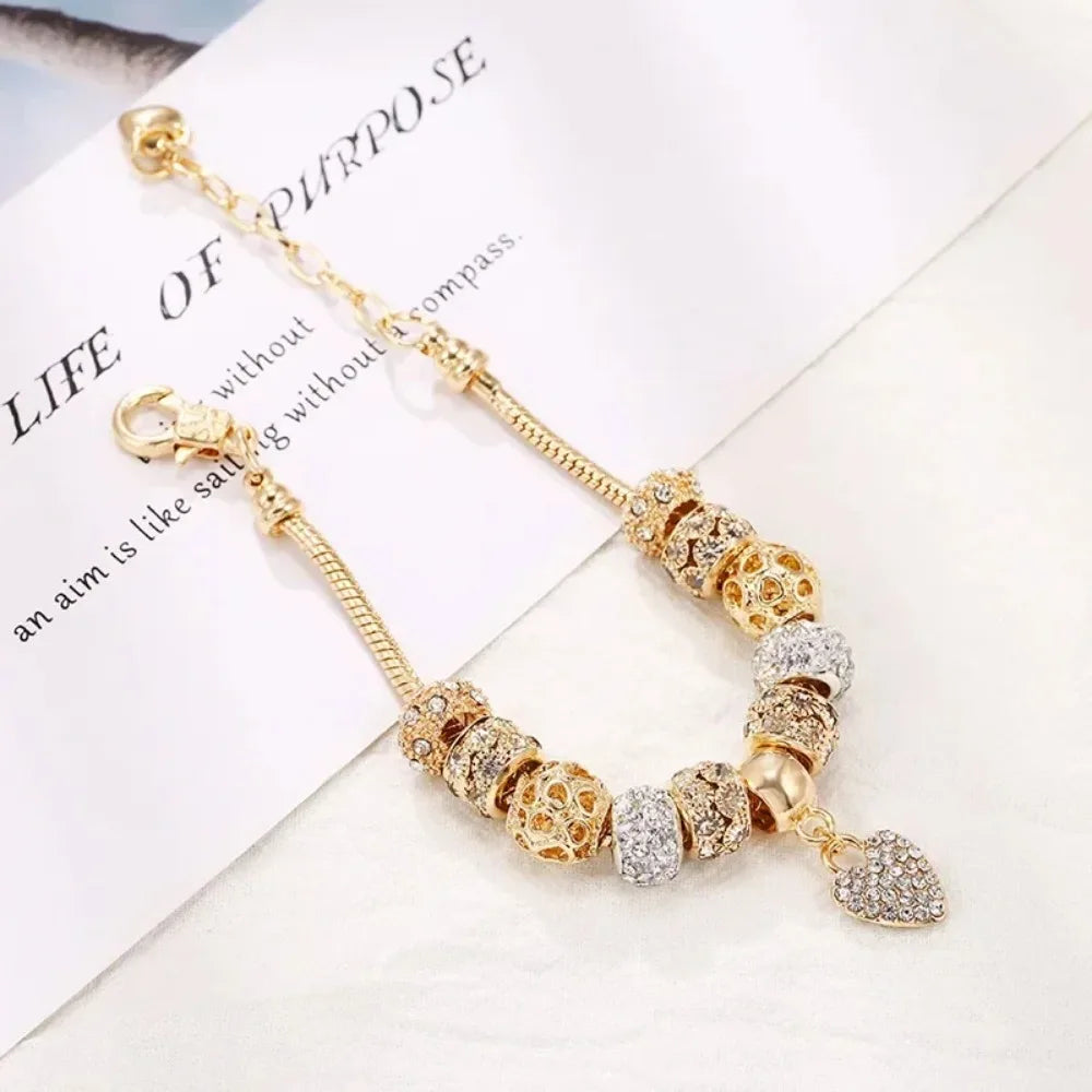 https://ae01.alicdn.com/kf/S7d3ac0b5eaeb4f5bbb5215481261b2b3y/New-Charm-Crystal-Heart-Beads-Charm-Bracelets-Gold-Color-Stainless-Steel-Snake-Chain-Brand-Bangle-for.jpg