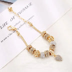 https://ae01.alicdn.com/kf/S7d3ac0b5eaeb4f5bbb5215481261b2b3y/New-Charm-Crystal-Heart-Beads-Charm-Bracelets-Gold-Color-Stainless-Steel-Snake-Chain-Brand-Bangle-for.jpg