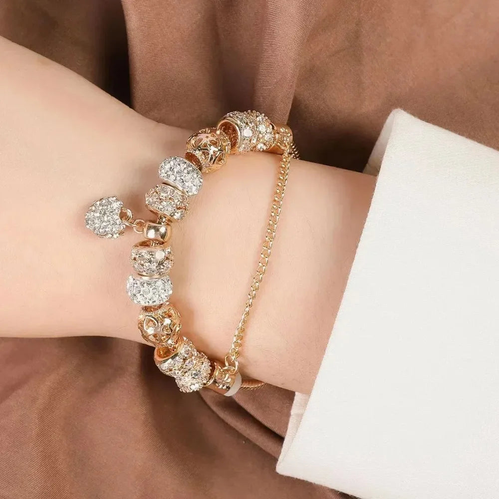 https://ae01.alicdn.com/kf/S5a502e56175b4154b7e4828ce76d92f0e/New-Charm-Crystal-Heart-Beads-Charm-Bracelets-Gold-Color-Stainless-Steel-Snake-Chain-Brand-Bangle-for.jpg