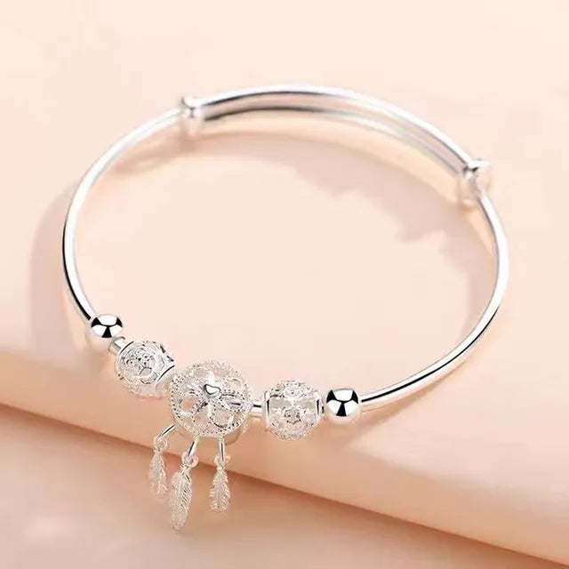 https://ae01.alicdn.com/kf/S93c00283544542f0bdb265465a6f10b4U/Silver-Color-Round-Lucky-Bead-Sakura-Snowflake-Dreamcatcher-Charm-bracelets-Bangle-for-women-bracelet-Elegant-love.jpg_640x640.jpg