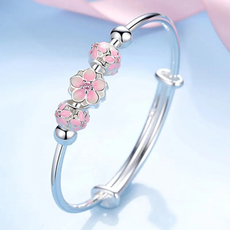 https://ae01.alicdn.com/kf/S726763fc2eb24c13bbabd001e138251dP/Silver-Color-Round-Lucky-Bead-Sakura-Snowflake-Dreamcatcher-Charm-bracelets-Bangle-for-women-bracelet-Elegant-love.jpg