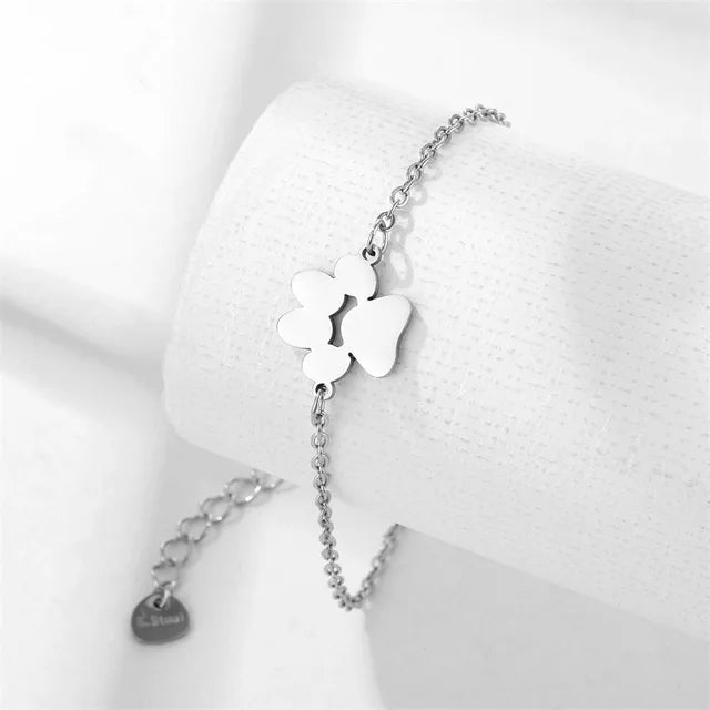 https://ae01.alicdn.com/kf/Scab1118dd80e471fa1b022c18f8ecc2cb/Stainless-Steel-Pet-Paw-Footprint-Bracelets-Shellhards-Cute-Animal-Tassut-Cat-Dog-Paw-Charm-Bracelet-for.jpg_640x640.jpg