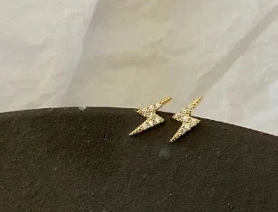 Spotlight Bolt Earrings, worn on model