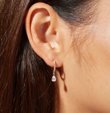 Birthstone Glow Earrings 18K, worn on model
