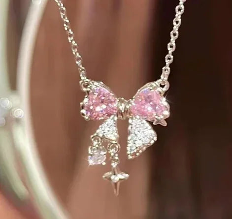Bow & Cross Necklace, worn on model